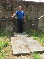 Dolton grave.  ( A partial collapse of roof exposed a glass lidded coffin) ©fnrc
